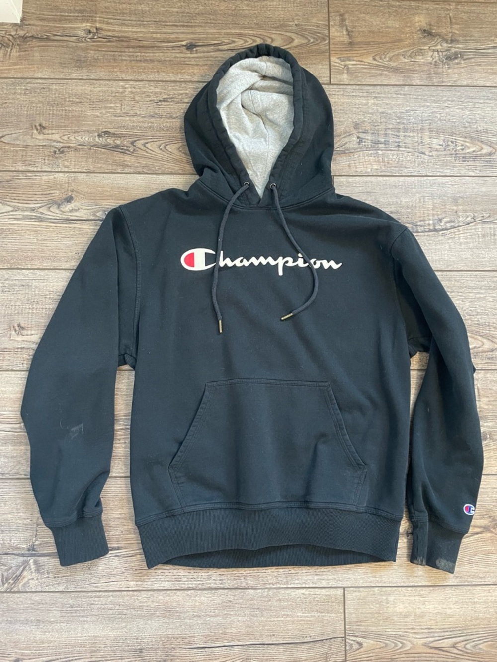 Champion black hoodie size large‼️